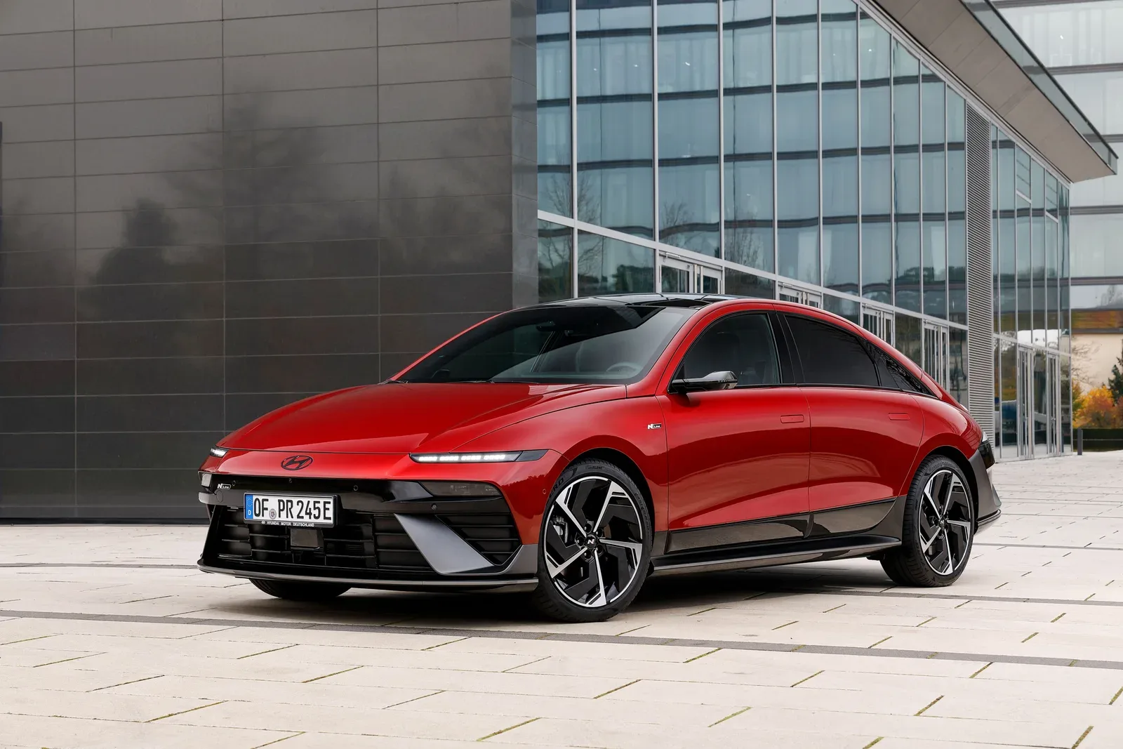Hyundai IONIQ 6, front three-quarter view outdoors.